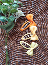 Load image into Gallery viewer, Yellow 2" Bow Snap Hairclip